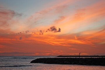Sunset over Waikiki beach in Honolulu, Hawaii