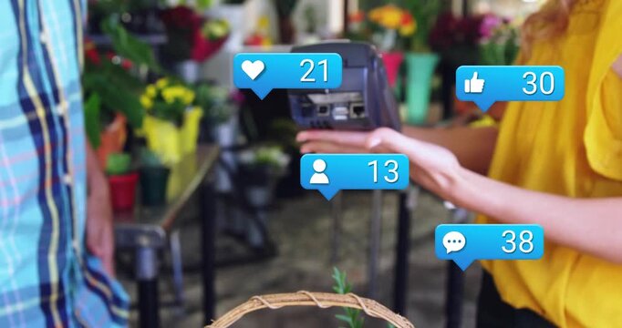 Blue bubbles popping around wicker basket, counts rising, florist lifting terminal, customer taking