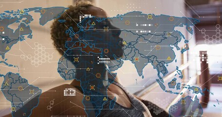 Woman at barre leaning back, initiating tech world-map HUD while opening chest and holding pose - Powered by Adobe