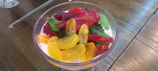 Close-Up of Es Campur or Es teler, a Colorful Southeast Asian Mixed Ice Dessert with Jellies and Coconut Milk