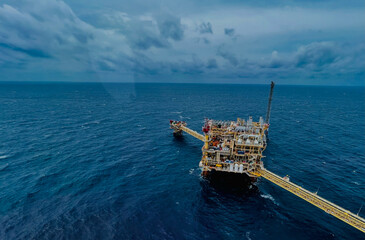 Offshore Oil and Gas Production Platform in the Sea on a Cloudy Day