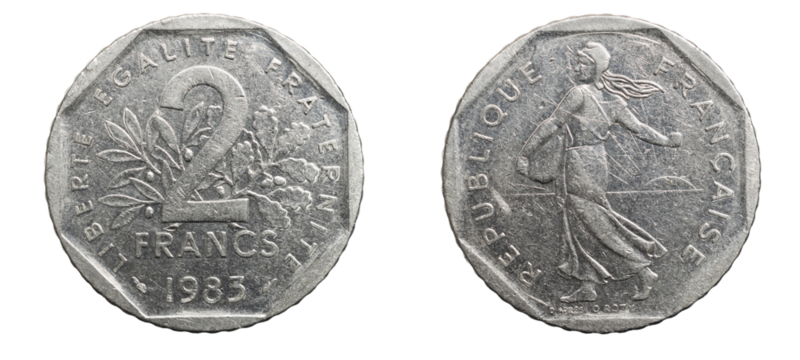 two french franc coin isolated on white background