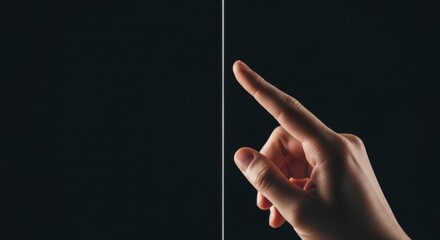 Human hand touching a thin white line on a dark background.