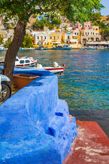 Symi town on Symi island with colorful neoclassical houses, Greece