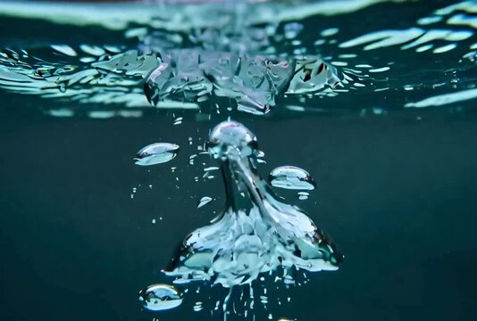 Underwater bubbles ascent creating dynamic motion in clear liquid environment presenting buoyancy in aquatic footage with teal background 164c