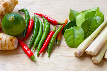 Ingredients for Thai food, Tom Yum. Kaffir lime leaves, galangal, lemongrass, lime, and chilies.