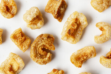 Crispy pork cracklings, a crunchy savory snack.