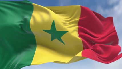 Senegal's vibrant national flag waving gracefully in the wind against a bright blue sky, a symbol of pride and unity for patriotic celebrations