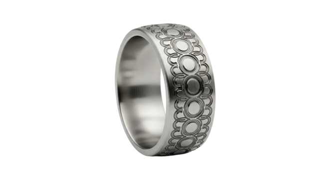 An elegant metal ring with a detailed engraved ornamental pattern, showcasing a sophisticated brushed texture and timeless design in a dramatic, angled studio perspective