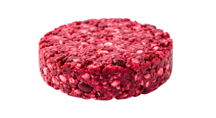A close-up of a single raw vegan burger patty made from beetroot and beans, showcasing the vibrant red color and coarse texture of the plant-based, uncooked food
