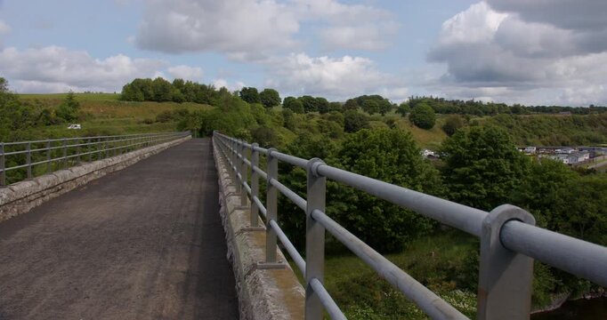 Wide shot looking north of the cycle path on top of the North water viaduct over the river north ESK