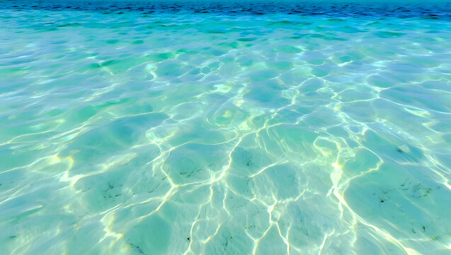 Crystal clear turquoise ocean water with sunlight reflections on the surface - Powered by Adobe