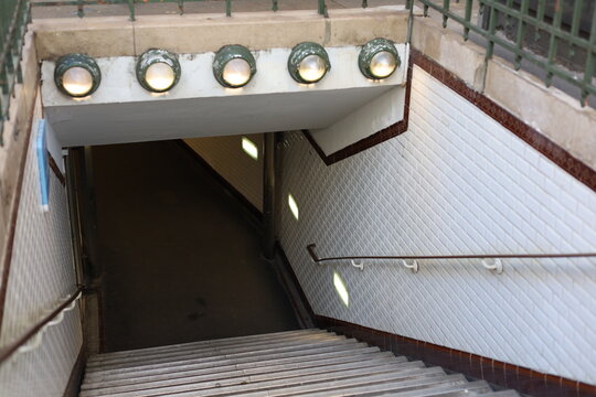 Old fashioned metro subway entrance with stairs down vertical photo