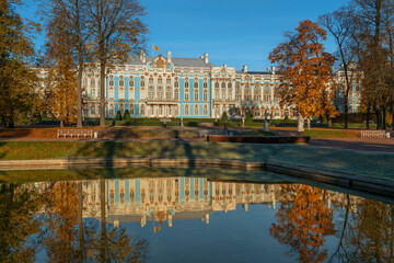 Fototapeta premium Catherine Palace with a reflection in the Mirror Pond if the Catherine Park of Tsarskoye Selo on a sunny autumn day, Pushkin, Saint Petersburg, Russia