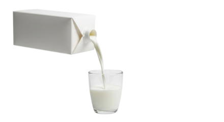 Milk pouring from carton into glass 