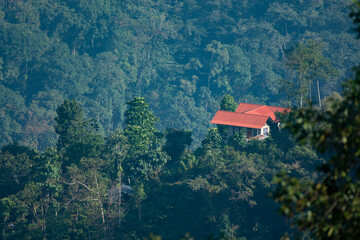 Traditional Himalayan Hut on Mountain Slope in Remote Village