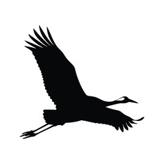 Black silhouette of a crane bird in flight with wings spread white background