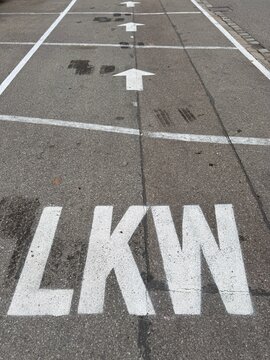 LKW Road Marking with Arrows on Asphalt