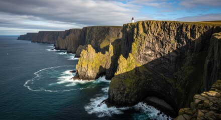 Dramatic coastal cliffs of northern landscape with towering rock formations and powerful ocean waves