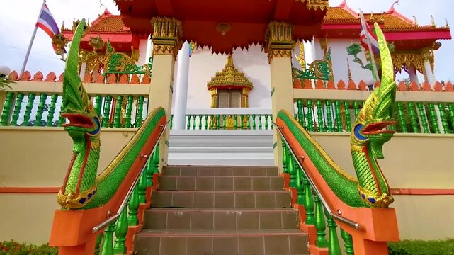 Suwankeereewong Temple green naga statue statues sculpture sculptures stairs Thailand.