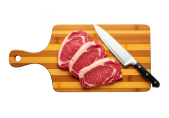 Red meat sliced on bamboo cutting board with knife in transparent background
