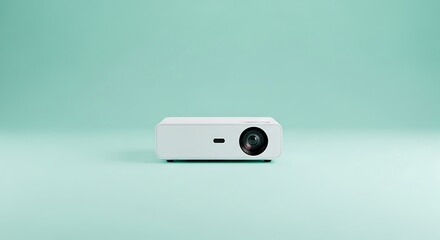 Experience vibrant entertainment with this modern, portable projector on teal backdrop