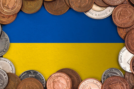 Coins on flag of Ukraine trading investment business currency concept
- Powered by Adobe