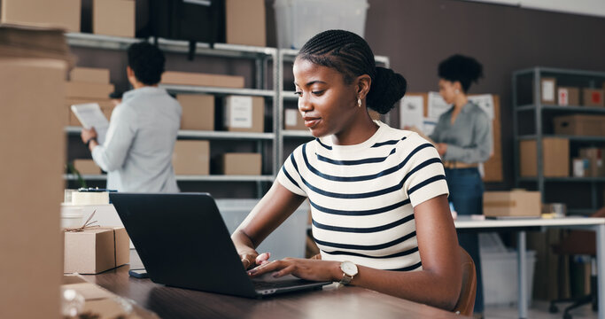 Logistics, woman or smile with laptop in small business for delivery tracking, inventory or shipping. Supply chain staff, person and tech in warehouse for order update, procurement email and reviews - Powered by Adobe