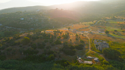 Gelemis, Turkey. Ancient Patara city with triple Triumphal Arch of Mettius Modestus in morning...
