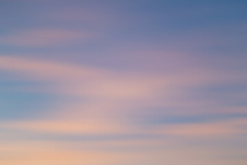 Abstract background featuring a soft gradient of pastel tones blending seamlessly, evoking calmness and serenity, perfect for use as a backdrop or design element in creative projects.