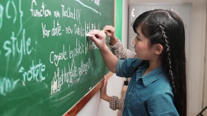 Skilled asian girl writing engineering prompt and programing system while standing blackboard with generated AI prompt written by diverse smart student at STEM technology lesson. Education. Pedagogy. - Powered by Adobe