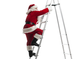 Back view of Santa Claus climbing a ladder