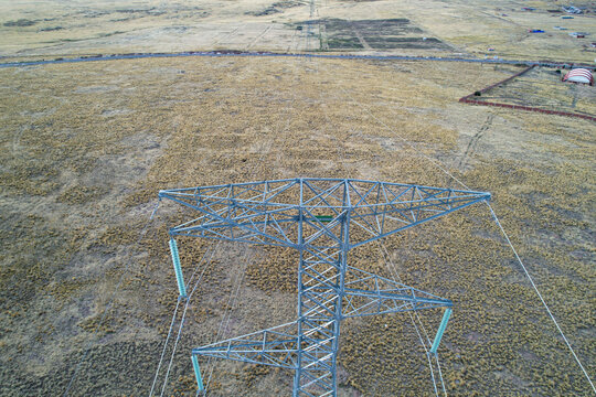 Aerial view of 400 kv high voltage towers for the transmission of electrical energy from distant hydroelectric plants