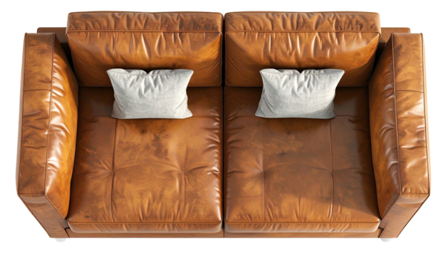 Leather couch, overhead view, two pillows, warm, cozy
