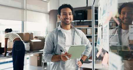 Glass wall, logistics and man with tablet for thinking, ecommerce ideas or analysis. Technology, smile and entrepreneur with board for shipping, distribution strategy and vision with graphs in office