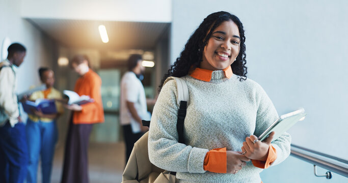 Woman, student and portrait with tablet at college, confidence and pride for scholarship at campus. Girl, happy and tech with backpack, application or education for learning development at university