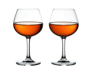 Two wineglasses filled with golden liquid