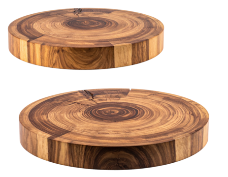 Two round wood cutting boards show natural rings
