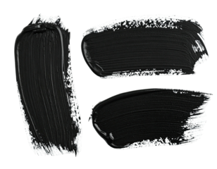 Three black paint brushstrokes on a black background