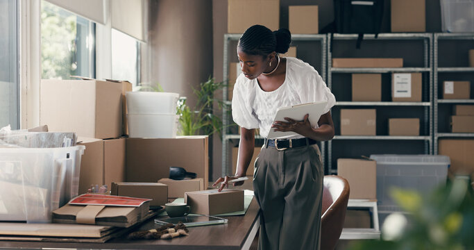 Ecommerce, box and clipboard with black woman in warehouse for shipping, distribution and courier. Logistics, supplier startup and inventory checklist with person for supply chain, order and cargo