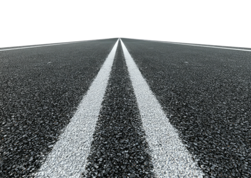 Road with double white lines disappears into darkness
