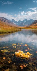 Serene alpine lake reflecting snow-capped mountains under a vibrant autumn sky; yellow flowers float on crystal-clear water amidst fallen leaves
