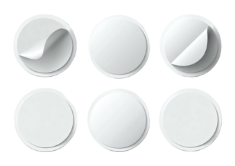 Round white stickers, some peeled at corners