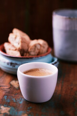 Cup of coffee on rustic wooden background. Soft focus. Copy space	