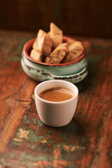 Cup of coffee on rustic wooden background. Soft focus. Copy space	