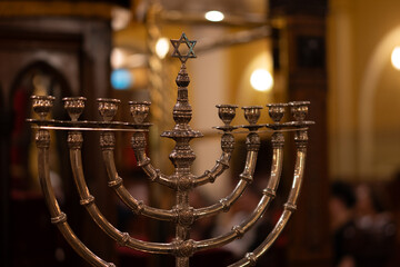 Elegant menorah shines in synagogue symbolizing Jewish heritage tradition spiritual celebration
