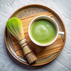 Matcha green tea latte recipe with bamboo whisk and tray for healthy drink