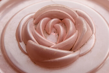 Close-up detail of a flower shaped ornament made of plastic