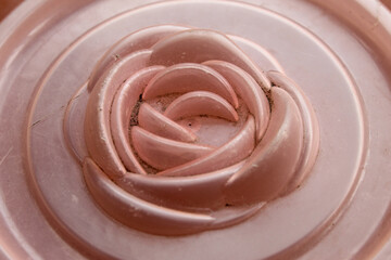 Close-up detail of a flower shaped ornament made of plastic