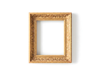 Ornate antique gold picture frame with detailed carvings on a white background